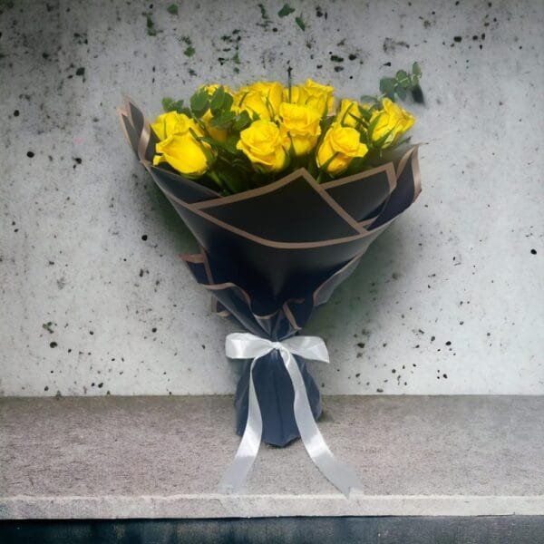 Timeless Yellow Arrangement: Sunny Yellow Roses with Eucalyptus in Black and White