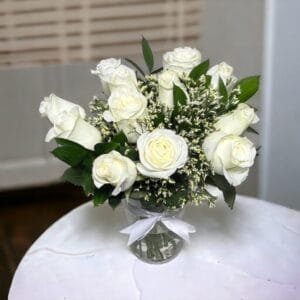 Pure White Elegance Bouquet: Classic Rose Cylinder with 12 White Roses, Limonium, and Ruscus