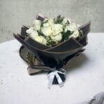 Elegant White Rose Bouquet: 12 White Roses with Limonium & Ruscus in Black and White