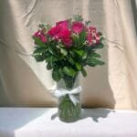 Blushing Romance Bouquet: Classic Arrangement with 12 Roses, Limonium, and Ruscus | Elegant Cylinder Vase