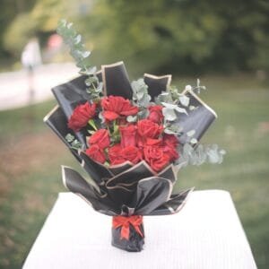Enchanting Red Rose Bouquet: Classic Freestyle with Eucalyptus, Black Wrapping, Red Ribbon