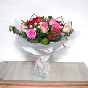 Sweet Enchantment: Pink, Red, and White Rose Bouquet with Eucalyptus | White Wrapping, Pink Ribbon