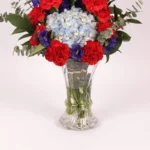 Amour Blooms: Elegance Captured in a Vase - Blue Hydrangea, Delphinium, Red Carnations