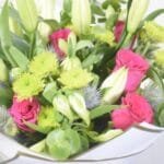 Mixed Floral Delight: Lilies, Hot Pink Roses, Chrysanthemum & Eryngium in White and Pink