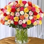 Bunch of 100 Mixed Roses In Glass Vase