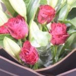 Timeless Mixed Arrangement: White Lilies, Red Roses with Eucalyptus in Black and Red