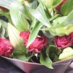 Timeless Mixed Arrangement: White Lilies, Red Roses with Eucalyptus in Black and Red