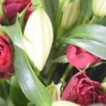 Timeless Mixed Arrangement: White Lilies, Red Roses with Eucalyptus in Black and Red