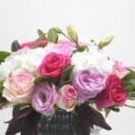 Blushing Mixed Flower Arrangement in Glass Vase: Mixed Roses, Hydrangea, and Lisianthus