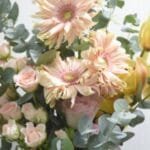 Elegant Garden: Cymbidium and Rose Pink Vase Arrangement with Eucalyptus and Gerbera