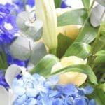 Bluesky Delight, Cylinder Vase Bouquet: Lily, Hydrangea, Creme Roses, Eucalyptus Touch