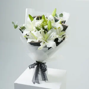 charming-white-lilies-bouquet-standard_1.webp