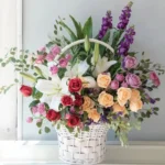 Fairy Spirit Basket: Red, Peach, and Purple Spray Roses, Oriental Lilies, Matthiola