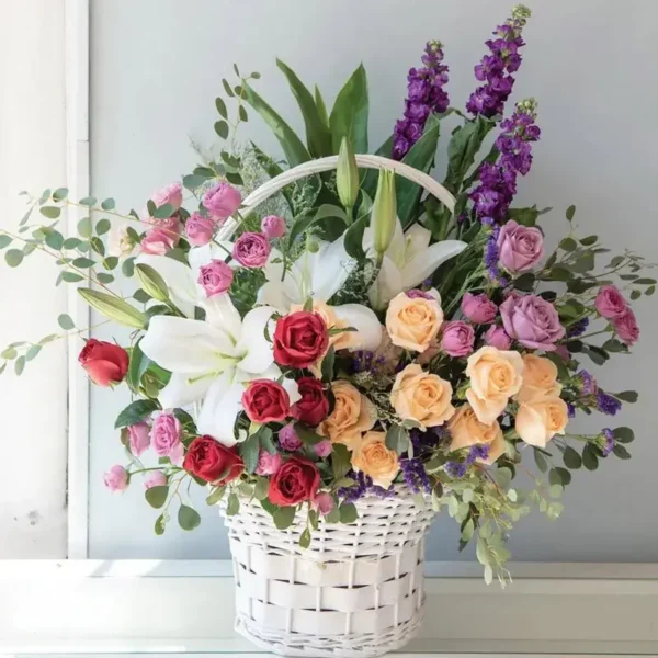 Fairy Spirit Basket: Red, Peach, and Purple Spray Roses, Oriental Lilies, Matthiola