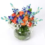 Fantastic Floral Display: 17 Blooms in Fish Bowl - Orange Roses and Blue Orchids