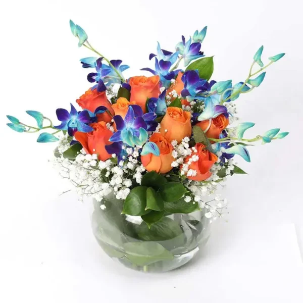 Fantastic Floral Display: 17 Blooms in Fish Bowl - Orange Roses and Blue Orchids