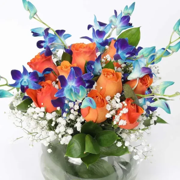 Fantastic Floral Display: 17 Blooms in Fish Bowl - Orange Roses and Blue Orchids