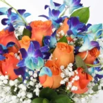 Fantastic Floral Display: 17 Blooms in Fish Bowl - Orange Roses and Blue Orchids