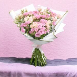 Fresh Garden Blooms: Mixed Spray Rose Pink Bouquet with White Wrapping and Pink Ribbon