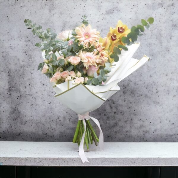 Morning Sun Delight: Cymbidium, Gerbera, Spray Rose, and Rose Pink Bouquet with Eucalyptus, White Wrapping, Pink Ribbon