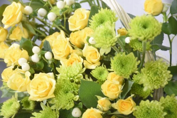 Sunny Basket: Classic Basket Arrangement with Yellow Roses, Green Chrysanthemums & Hypericum