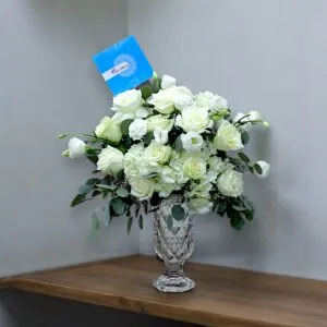 Exquisite White Hydrangea and Rose Arrangement in Glassware