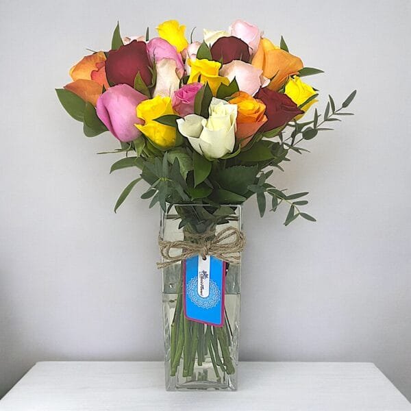 Vibrant Mixed Rose Bouquet with Eucalyptus in Cylinder Vase - Stunning Floral Display for Any Occasion