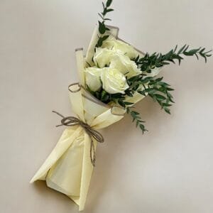 Pure Serenity: White Roses and Eucalyptus Bouquet