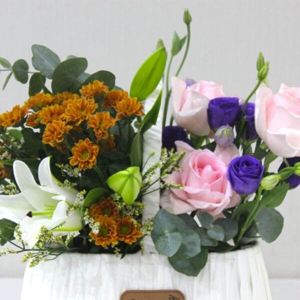 Elegant White Floral Arrangement in a Basket