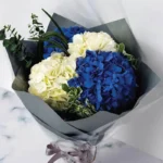 Monsoon Dream Bouquet: Blue Hydrangea, White Hydrangea | Eucalyptus, Pittosporum, Flexi Grass, Contrast Wrap, Satin Ribbon Bow
