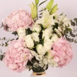 Blooms of Affection in Premium Ceramic Glass Vase: Pink Hydrangeas, White Roses, Oriental Lilies, Statice, Baby Blue Eucalyptus