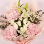 Pastel Paradise Bouquet: Pink Hydrangeas, White Roses, White Oriental Lilies, White Statice, Baby Blue Eucalyptus | Peach Wrap, Pink Ribbon Bow