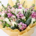 Pink and White Harmony Bouquet: 10 White Roses, 6 Pink Mattiloa, 6 White Carnations, 8 Pink Alstroemeria | Gypsophillia, Eucalyptus, Wrap, Ribbon Bow