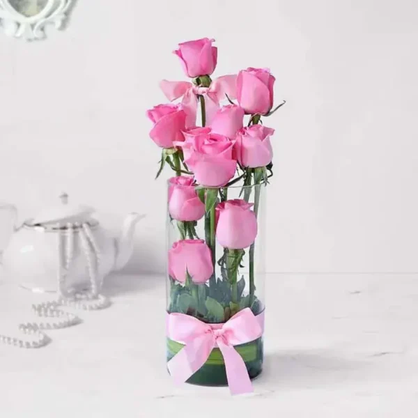 Pink Roses Cascade: Steps of Beauty in Vase - 10 Pink Roses, Green Leaves, Glass Vase, Ribbon Bow