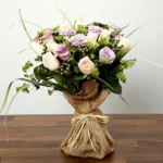 Purple and Peach Elegance: Rose Bouquet Delight