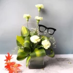 Spectacular Carnations: A Blooming Display of Elegance - White Carnations, Gypsophila, Dracaena Fragrans Massangeana Leaves
