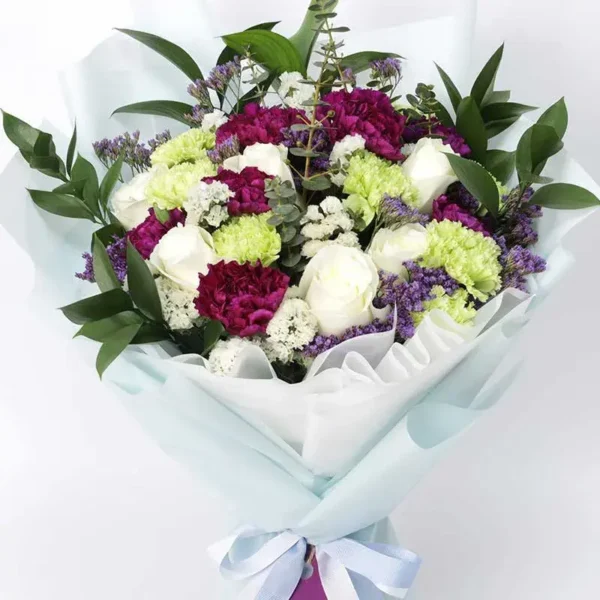 Youthful Blooms Bouquet: 6 White Roses, 8 Green Carnations, 7 Purple Carnations | 4 White Statice, Ruscus, Eucalyptus, Limonium | Sky Blue and White Wrap, Ribbon Bow